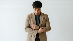 a man thinking of a stylish watch to fit his outfit