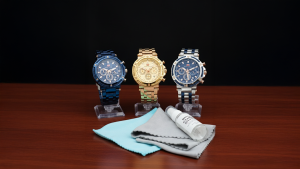 three luxury watch maintenance are shown on top of the table