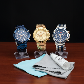 three luxury watch maintenance are shown on top of the table